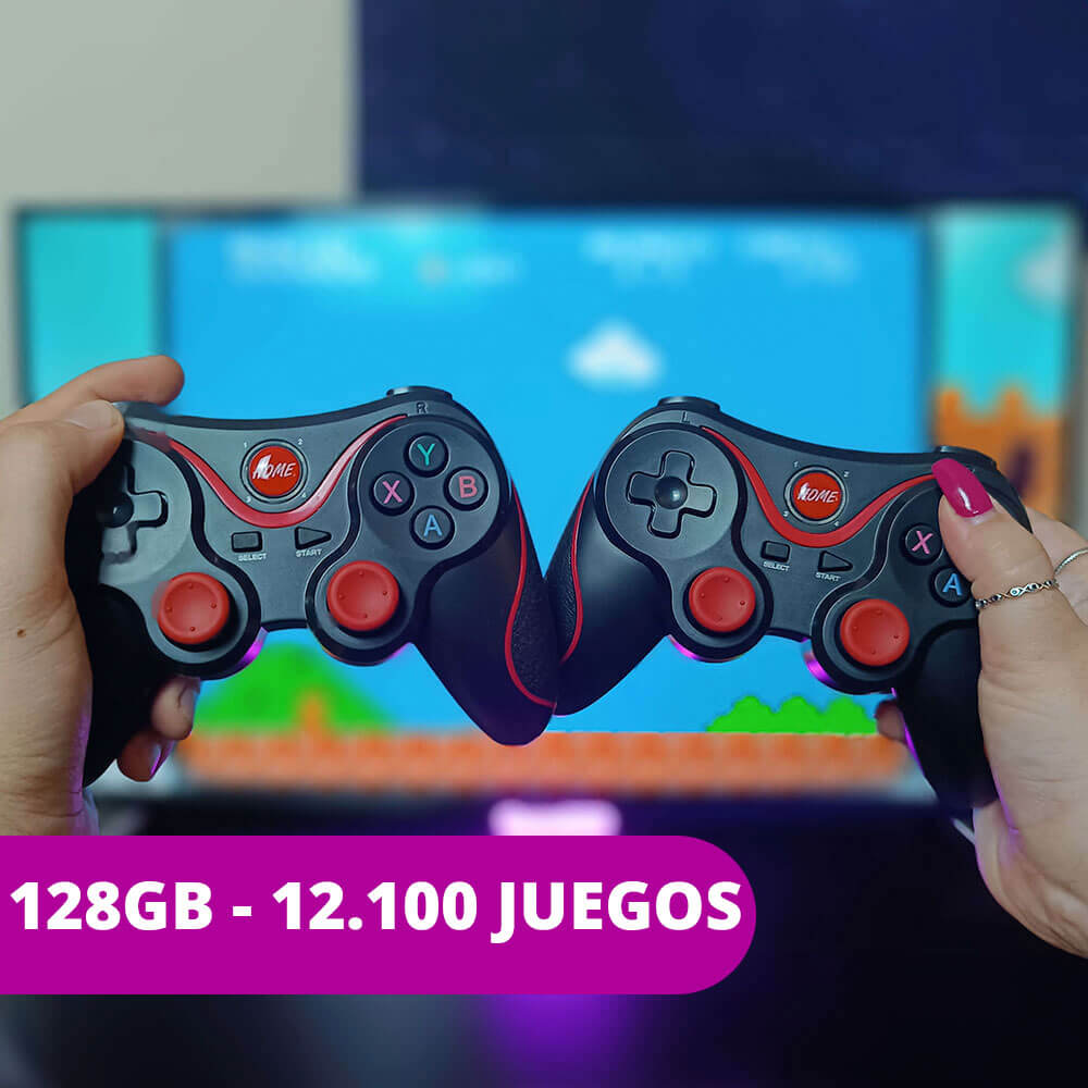 dos mando inalambrico de color negro y rojo chocando entre si sujetados por la mano de un hombre a la izquierda y de una mujer a la derecha con un cartel que pone 128 gb y los 12100 juegos que incluye